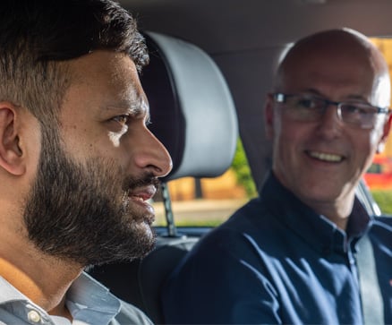 trainee driving instructor being mentored